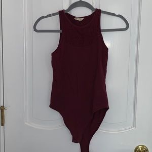 Maroon sleeveless body suit